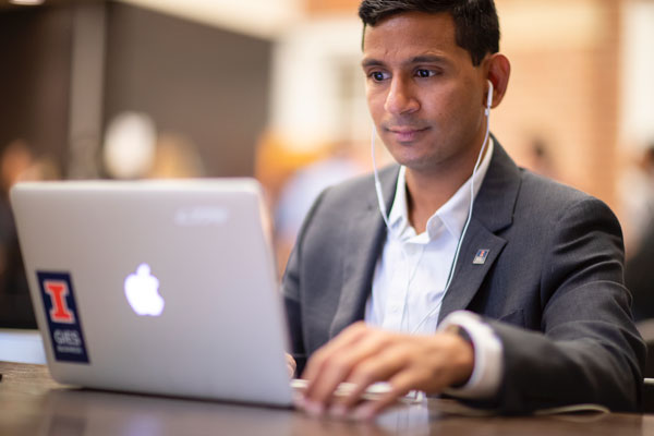 Student working at a laptop