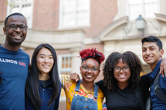 Gies graduate students outside of Wohlers Hall